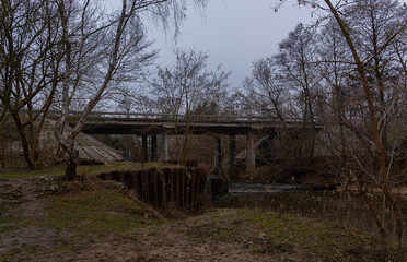 Fototapeta premium Bridge over the Świder River, near the city of Otwock, Masovia, central Poland