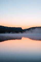 Fototapeta premium Floating Boat on Calm Lake