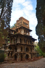 Fototapeta premium Botanical Garden – a secluded attraction of Taormina, exotic vegetation and interesting buildings