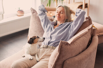 Happy middle aged Woman relaxing at home