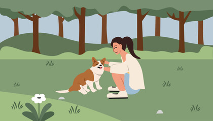 Woman stroking dog in the park. Leisure time. Spring. Summer. Walking in the park. Urban park. City park.