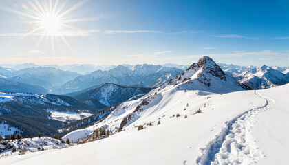 Snowy mountain peak under bright sunlight, serene winter landscape
