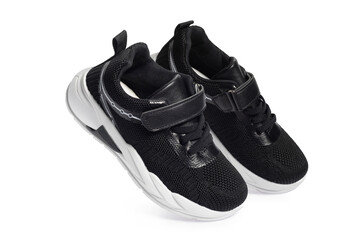 Black sneakers on white background, sports shoes, running shoes, comfortable shoes