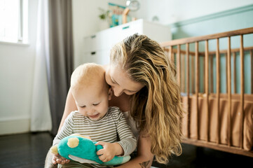 Relax, mother and baby on the floor, toy and bonding for development, support and loving at home....
