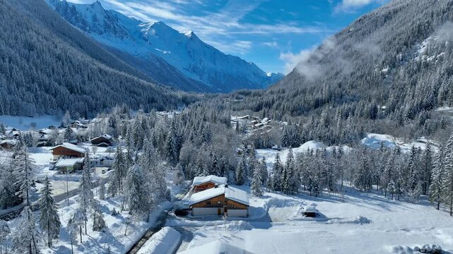 aerial view of Chamonix in winter, French ski resort in the Alps, snowy frosty alpine landscape in Chamonix Valley, drone view of alpine village