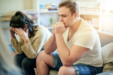 Conflict, upset and couple fighting on a sofa for toxic, cheating or relationship breakup. Upset,...