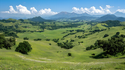 Rolling hills, mountain vista, sunny day, grassland. Use travel brochure