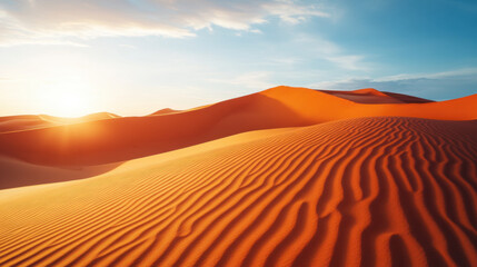 stunning landscape of deep orange sand dunes under bright sky, showcasing beauty of nature patterns and textures. warm sunlight enhances serene atmosphere