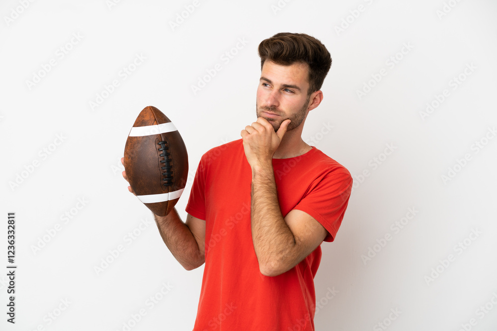 Poster Young caucasian man playing rugby isolated on white background and looking up