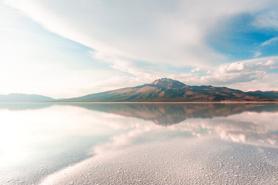 Salt surface with water in Salar de Uyuni salt flat in Altiplano, Bolivia.