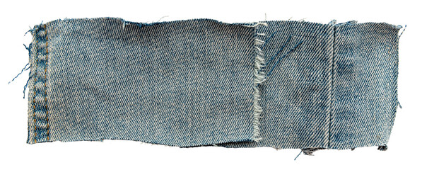 Piece of torn denim on a white background. Denim texture