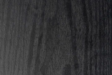 Black wooden board surface