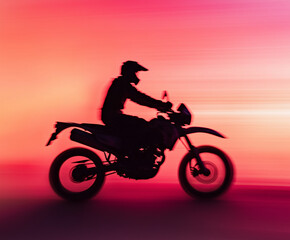 Motorcyclist silhouette riding at sunset, motion blur effect, high-speed adventure, dynamic biker scene, extreme sports, glowing pink and orange gradient.  
