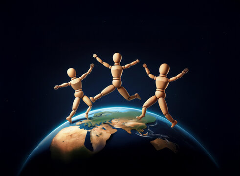 Three wooden figures joyfully leap across a miniature Earth against a dark backdrop, symbolizing global unity and celebration.