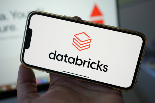 Roosendaal, The Netherlands - February 2, 2025: Person holding mobile phone with logo of the Databricks company,. leading in AI and data modeling, based in San Fransisco.