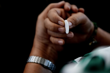 Woman Hand Holding Bread In A Holy Communion.