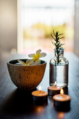 Flowers, rosemary and water in spa for beauty, wellness and health treatment. Salon aesthetic, essential oils and jar with herbs for cosmetics, aromatherapy and detox remedy for zen, calm and peace