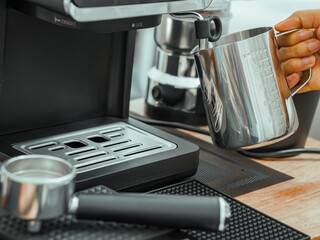 Young professionals people brew coffee beans at bar workplace. Female workers start up small business barista coffee maker. Businesswoman motivation coffee drink for breakfast. Energy boots