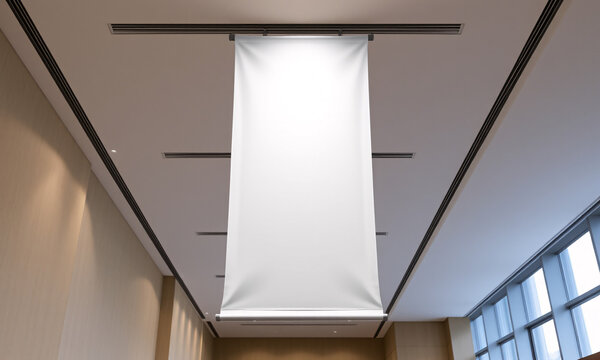 Ultra-realistic mock-up of a vertical banner with a blank design hanging in a well-lit conference hall