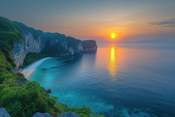 Stunning sunset reflects on tranquil waters beside a tropical beach in a secluded cove