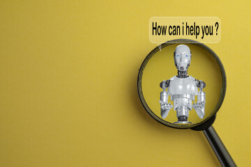 AI with 'How Can I Help You?' in Speech Bubble under magnifying glass over yellow background with copyspace concept for Artificial Intelligence, Chatbot Assistance, Virtual Assistant.