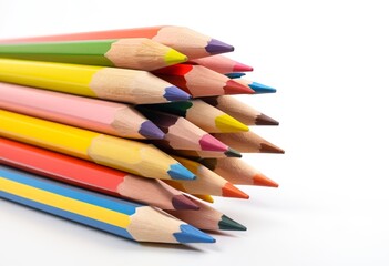 Naklejka premium Close up of colored colored pencils against a white background
