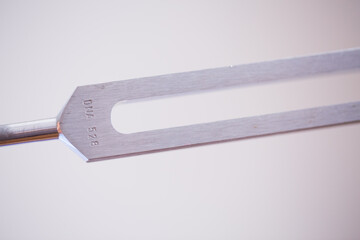 tuning fork on a fabric.