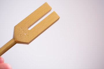 tuning fork on a fabric.