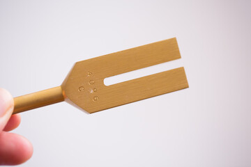 tuning fork on a fabric.