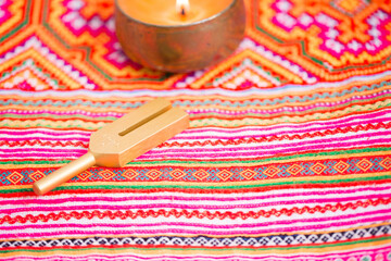 tuning fork on a fabric.