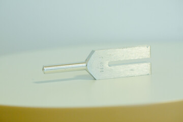 tuning fork on a fabric.