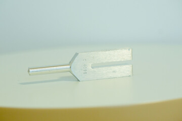 tuning fork on a fabric.