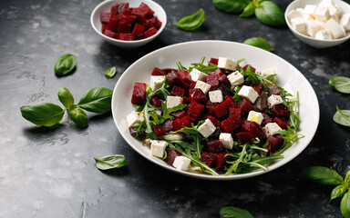 Fresh Beetroot feta salad with wild rocket and lemon dressing. Healthy food.