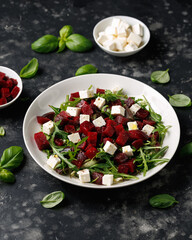 Fresh Beetroot feta salad with wild rocket and lemon dressing. Healthy food.