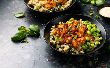 Sweet and sour tofu with spinach quinoa and steamed edamame beans. Healthy food.