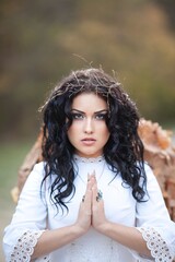 Fantasy woman angel praying.