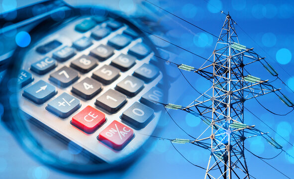 Power lines. Calculator for accounting for electricity prices. High voltage power lines under blue sky. Concept of calculating prices for energy supplies. Energy infrastructure costs