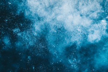 Captivating aerial view of a turbulent ocean with a blend of deep and light blue hues, accented by white foam, evoking a sense of mystery and the powerful beauty of nature.