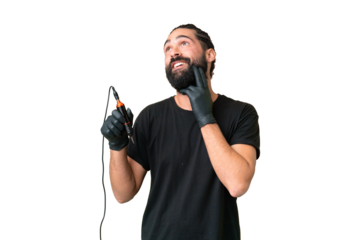 Tattoo artist caucasian man over isolated chroma key background thinking an idea while looking up