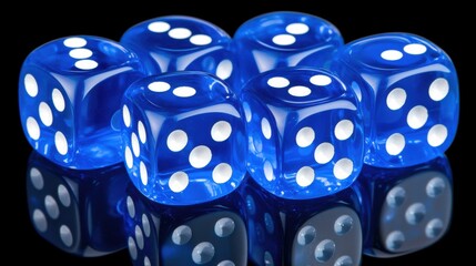 Cobalt blue dice set stacked on a sleek reflective surface creating a striking visual effect for gaming or decor