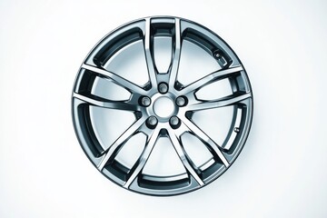 Obraz premium Captivating view of a sleek car wheel rim isolated on a clean white background showcasing exceptional craftsmanship and design