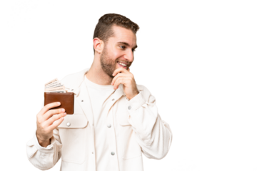 Young handsome blonde man holding a wallet over isolated chroma key background thinking an idea and looking side