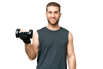 Young sport man making weightlifting over isolated chroma key background smiling a lot