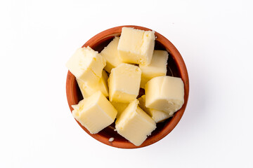 Butter that adds flavor to meals and is for breakfast on white background