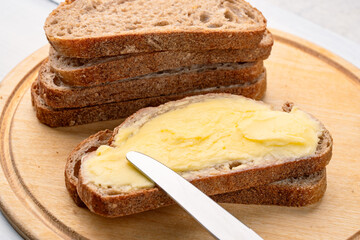 Butter that adds flavor to meals and is for breakfast on wooden background