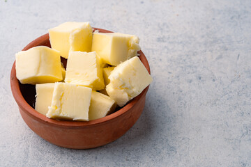 Butter that adds flavor to meals and is for breakfast on white  background