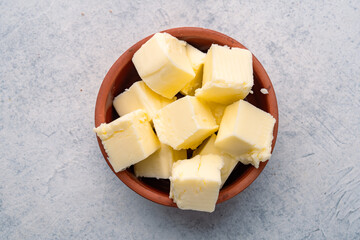 Butter that adds flavor to meals and is for breakfast on white  background