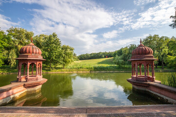 Fototapeta na wymiar Beautiful summer evening in a park. Landscape shot in Krishna valley at sunset. Park and temple complex at Balaton, Unagrn