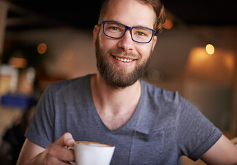 Coffee, smile and portrait of man in restaurant for digital nomad career with travel for...