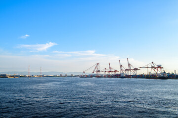 Osaka, Japan; 11 10 2024: Large cranes at Osaka port, Marine cargo, large port city and commercial center on the Japanese island